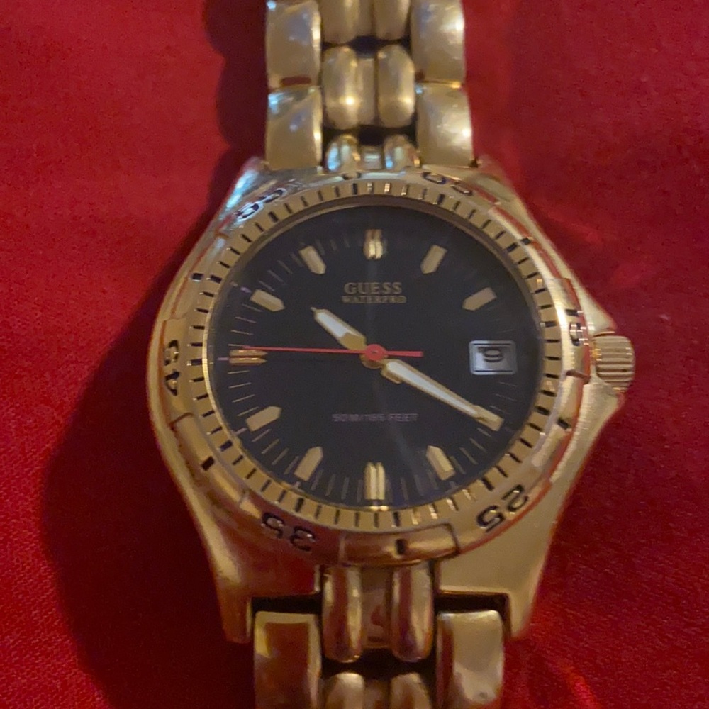 Guess Waterpro date Gold tone watch